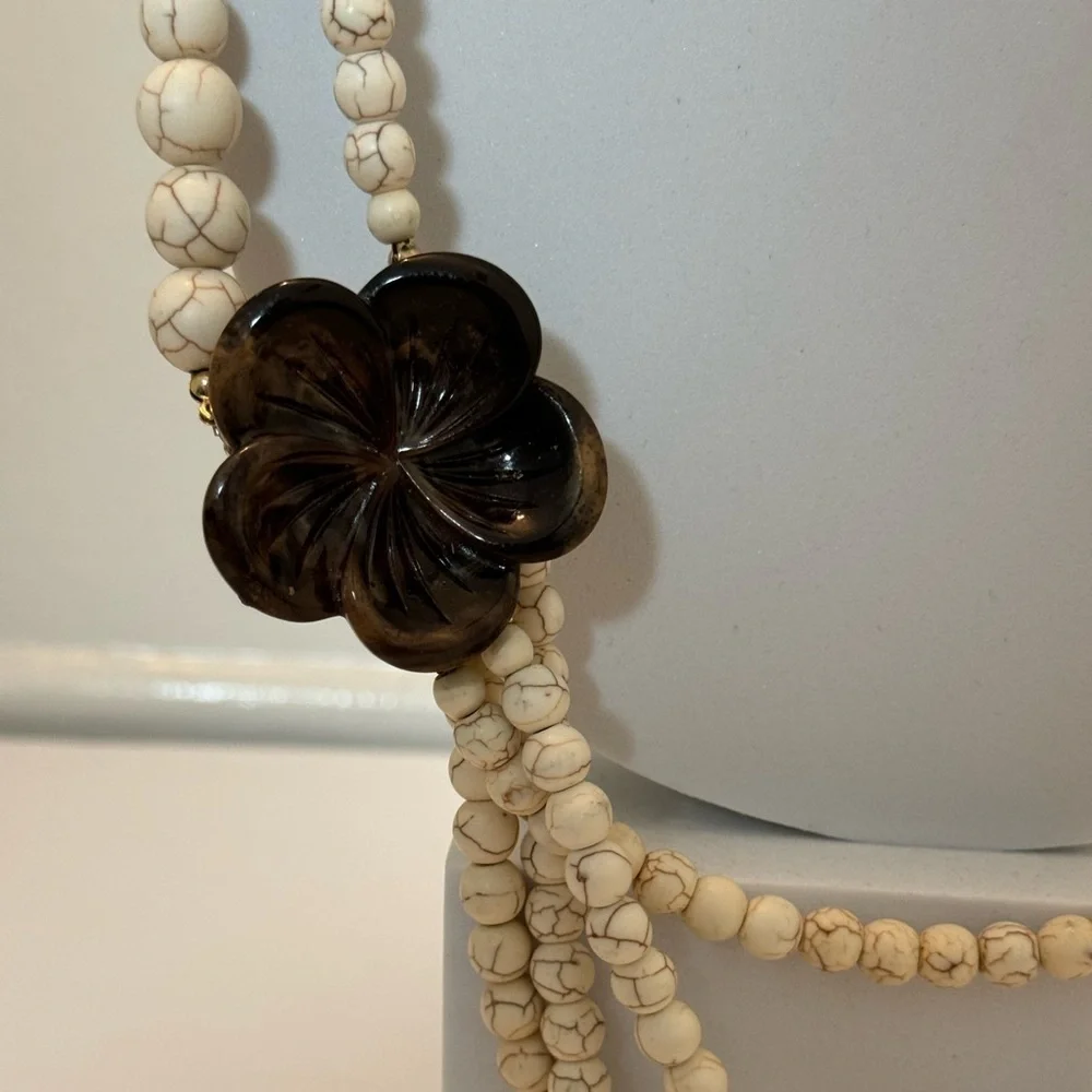Gorgeous earth tone beaded necklace with brown floral accents